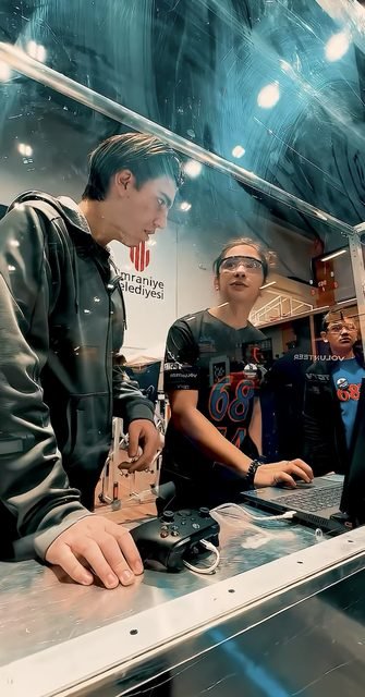Demir at the driver station with a controller